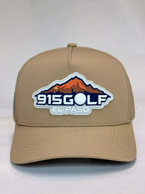 Front view of tan 915GOLF™ cap with raised El Paso mountain patch